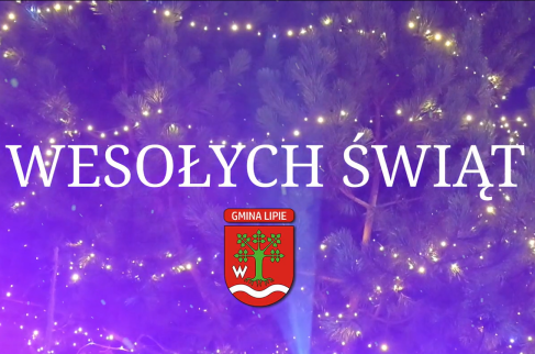 Napis wesołych świąt z herbem Gminy Lipie na tle rozświetlonej choinki
